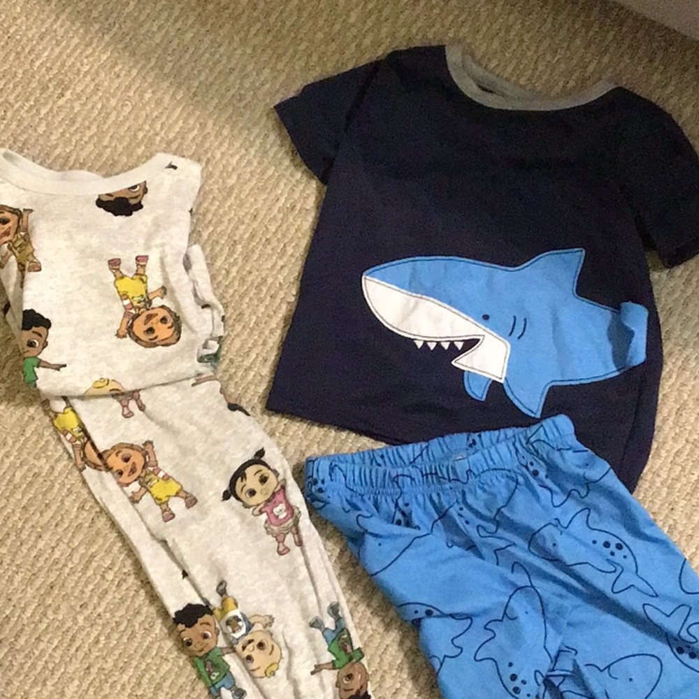 2 Paid Jammies sets. One CoCoMelon pants & short sleeve, One Sharks shorts set.